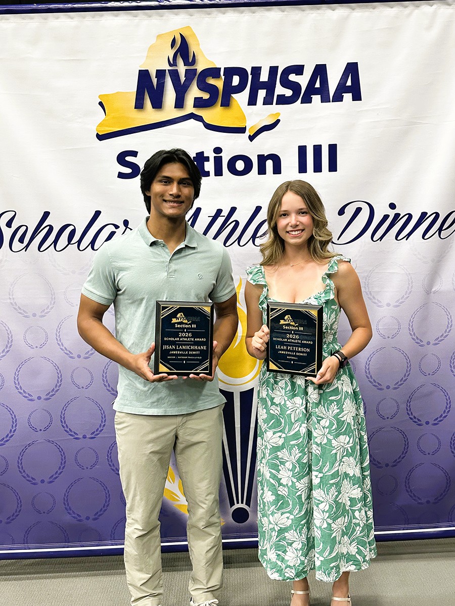 Section III Scholar Athletes Jisan Lamichhane and Lean Peterson pose with plaques.