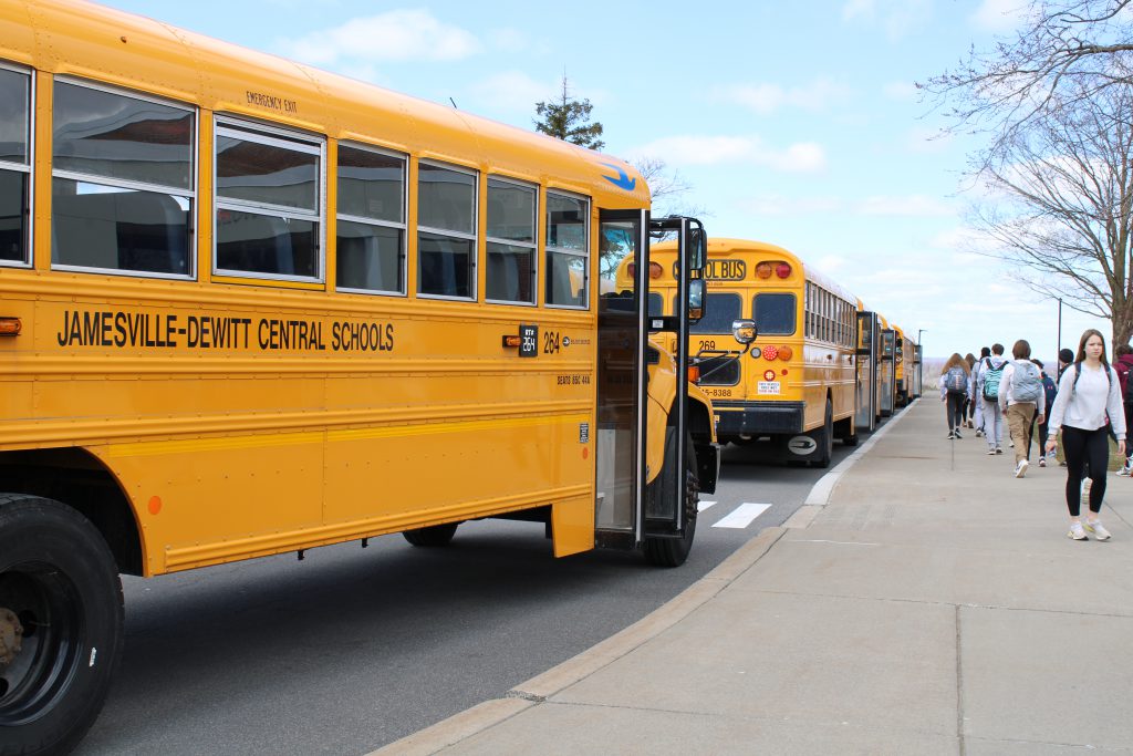 Photo of school buses lined up for dismissal at J-D High School.