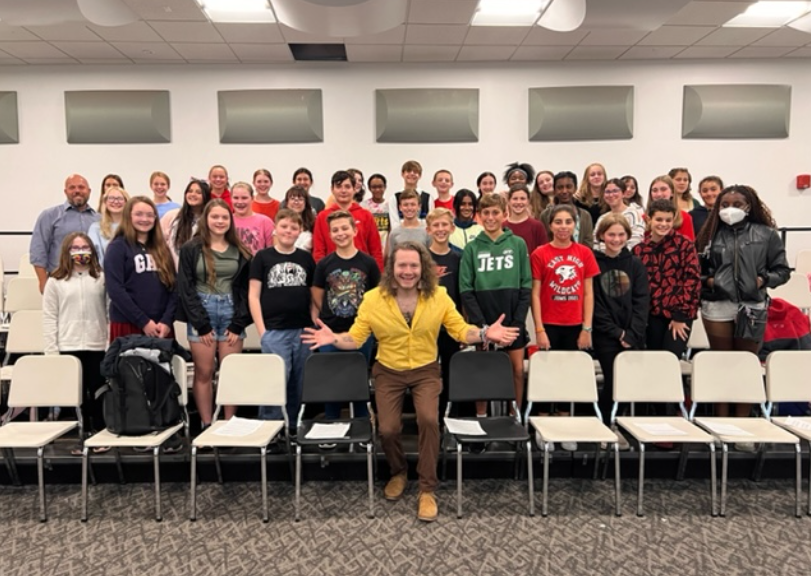 Image of Hughie Stone Fish with J-D middle school students.