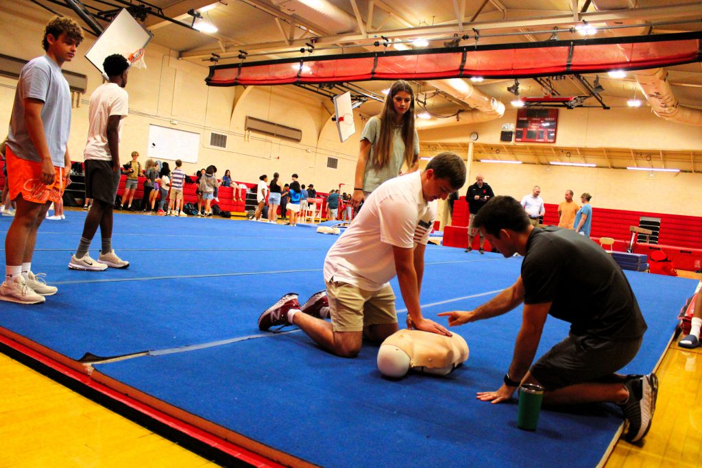 Photo of J-D High School students demonstrating hands-on CPR. 