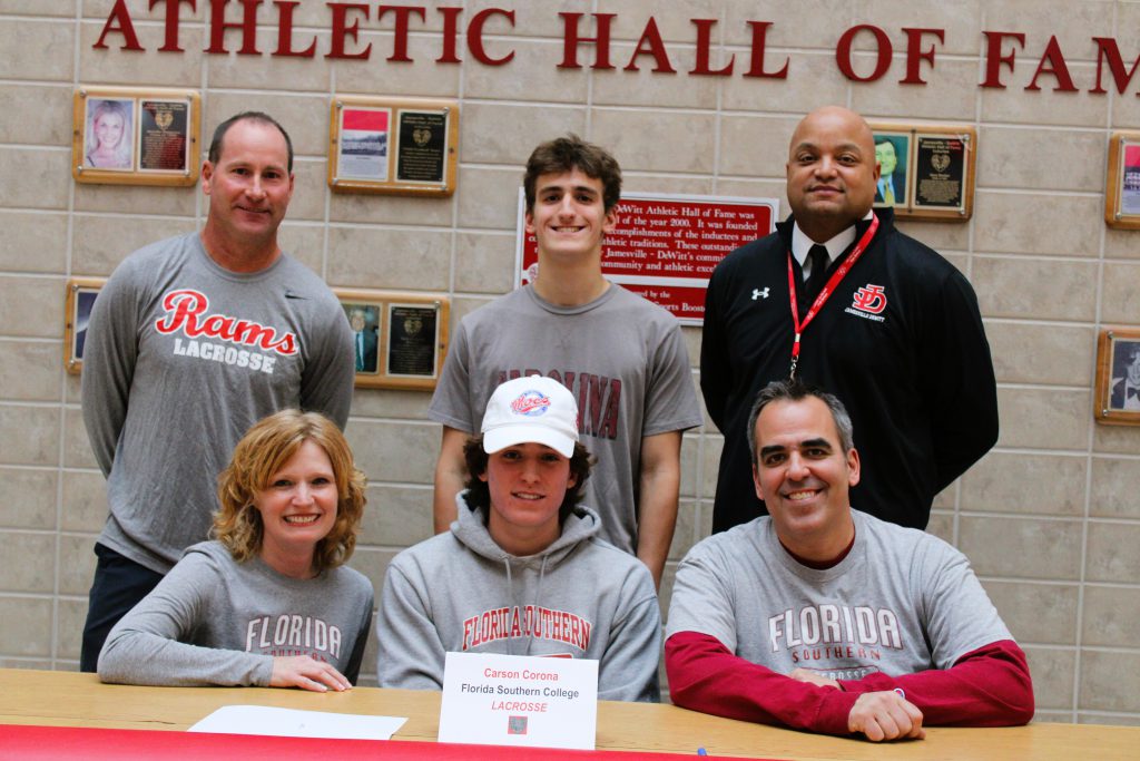 Image of Carson Carona signing letter of intent for Florida Southern College, Lacrosse.