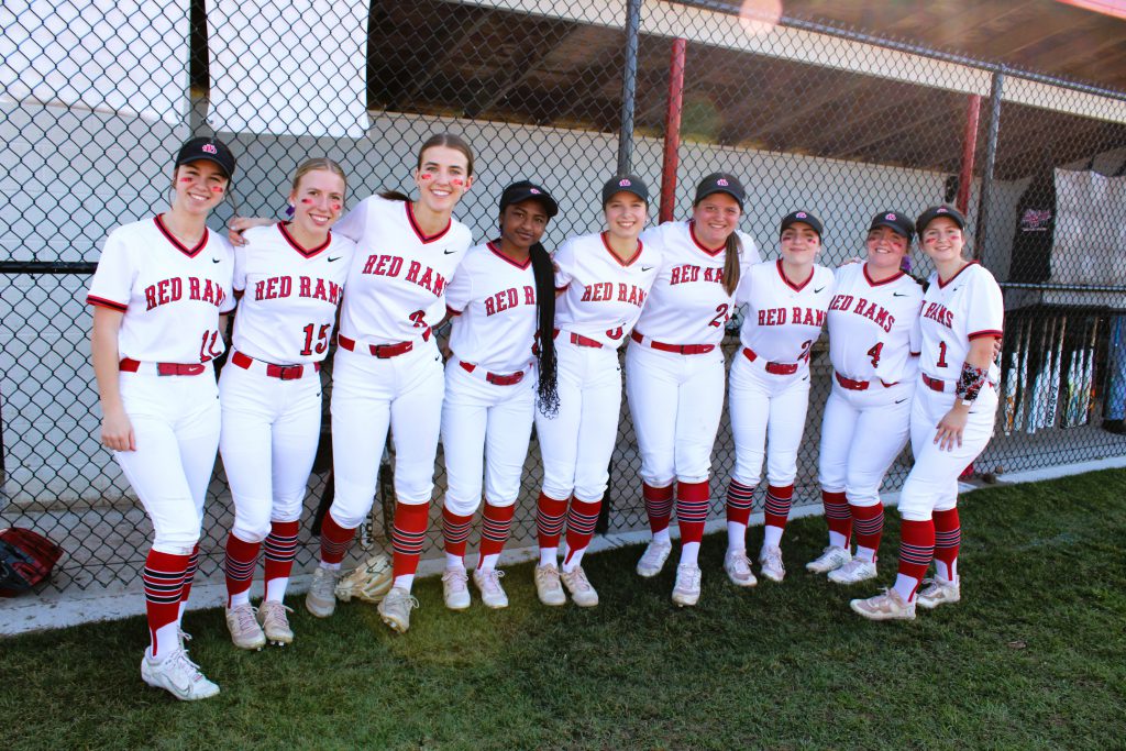 Image of J-D Varsity Softball players posing for the camera.