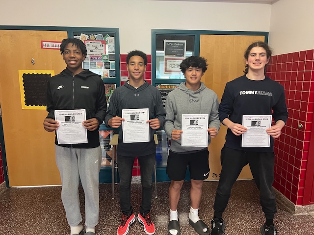 Image of Sion Willis, Carsyn Geisler Price, Carson Kim, and Enes Damkaci with awards.