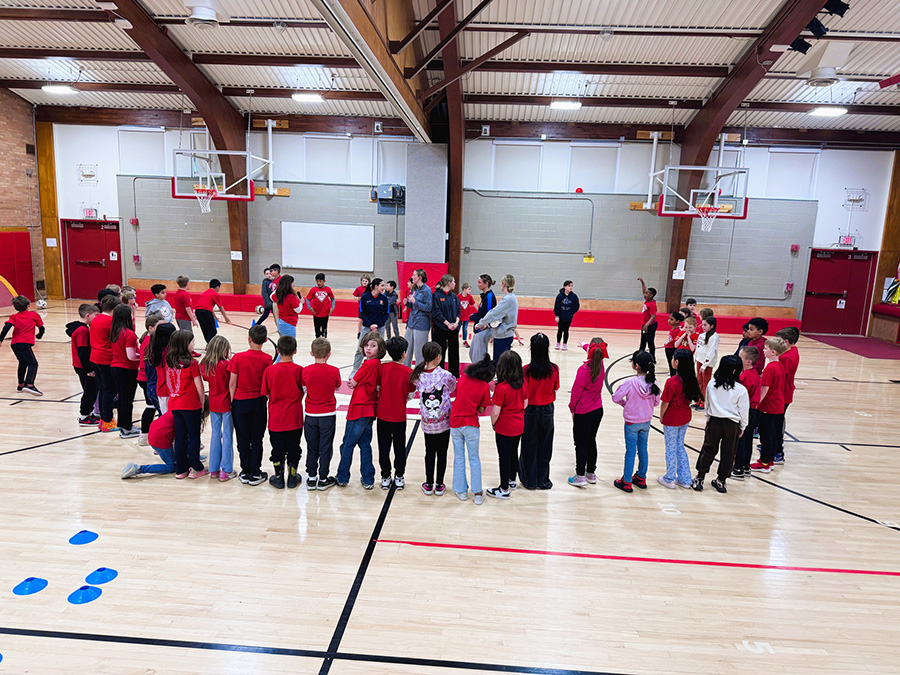 Jamesville students playing in gymnasium.