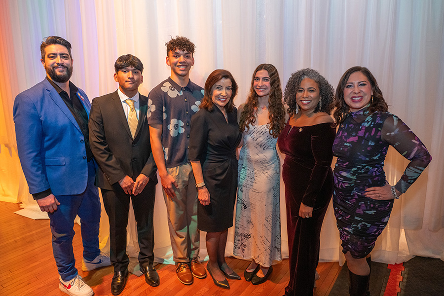 Students pose with Governor Hochul and staff as part of Puerto Rican Institute.