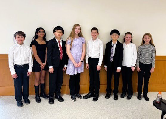 Elementary All-County Band group photo of Lucas Guntin, Trisha Prasad, Nathan Hahn, Isadora Cannon, Logan Czajkowski, Ethan Hahn, Lydia Clark, and Elle Antonacci.
