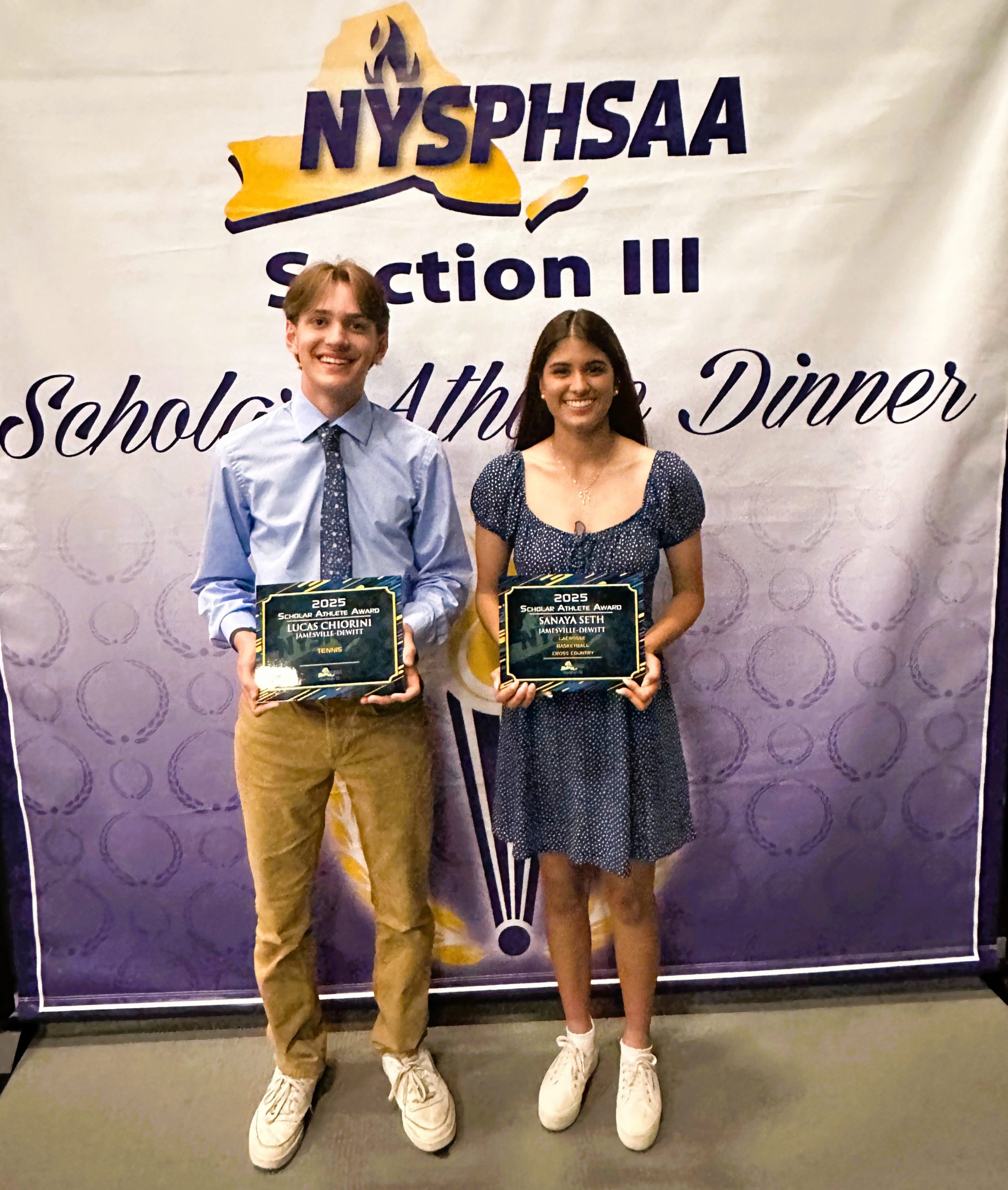 Two J-D High School students pose for photo at Scholar Athlete dinner.