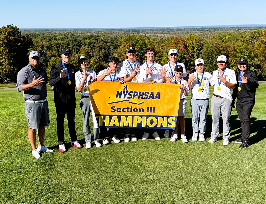 Boys Golf group photo with sectional banner.