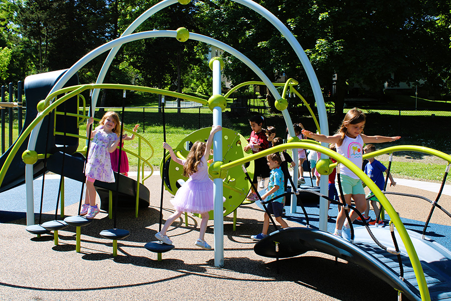 UPK students play on new playground.