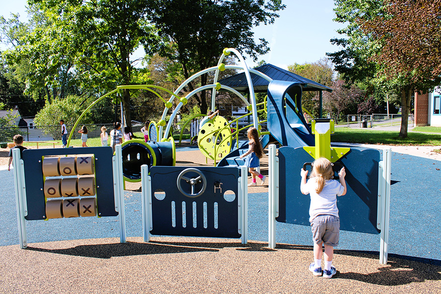 Students play on UPK playground.